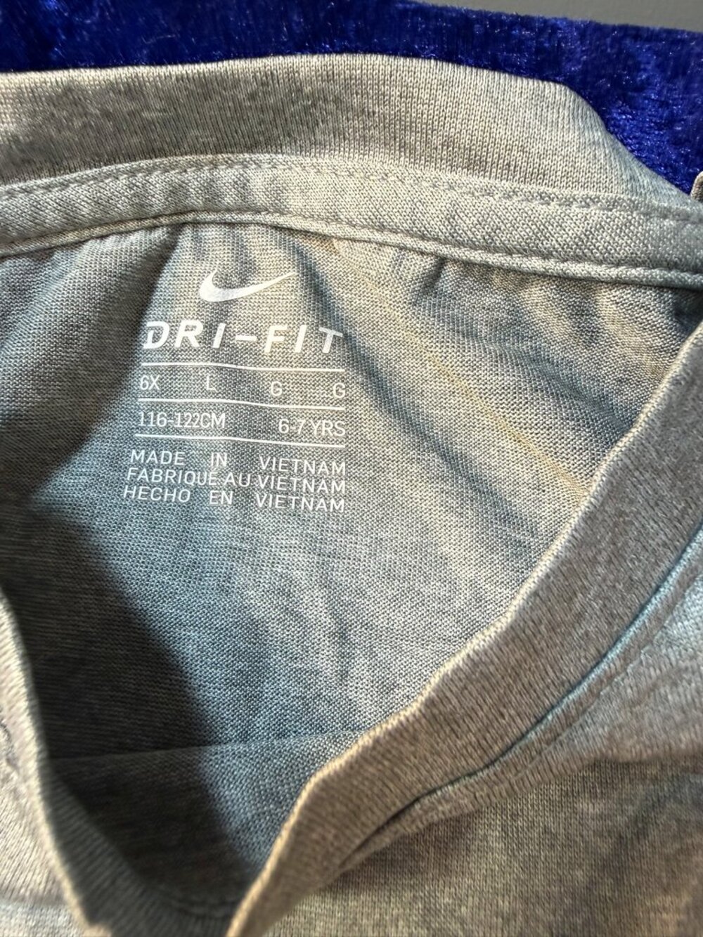 Girl's Nike Dri-Fit Gray Shirt with Pink Hint Swoosh